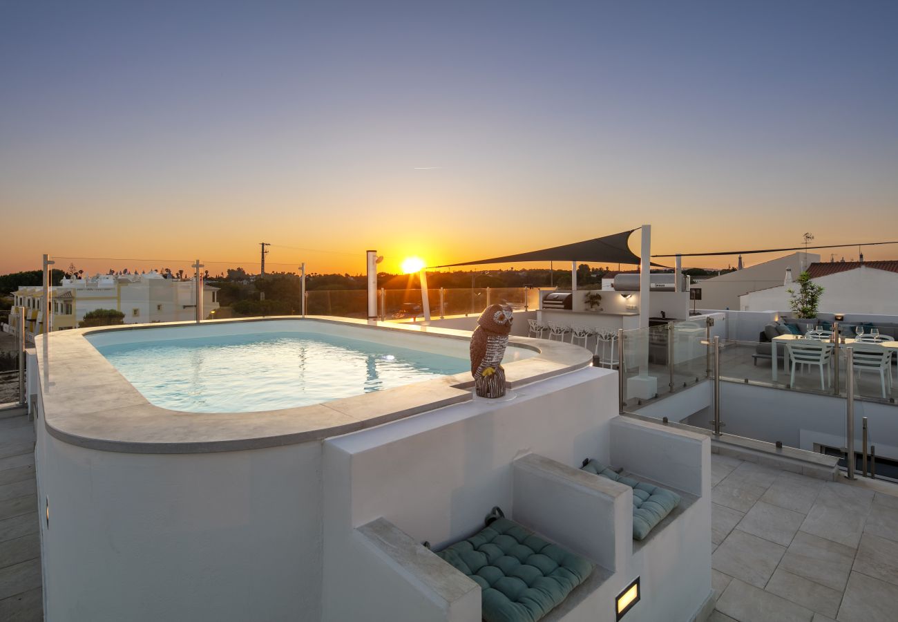 Roof terrace with private pool Casa Milhafre Benagil at night