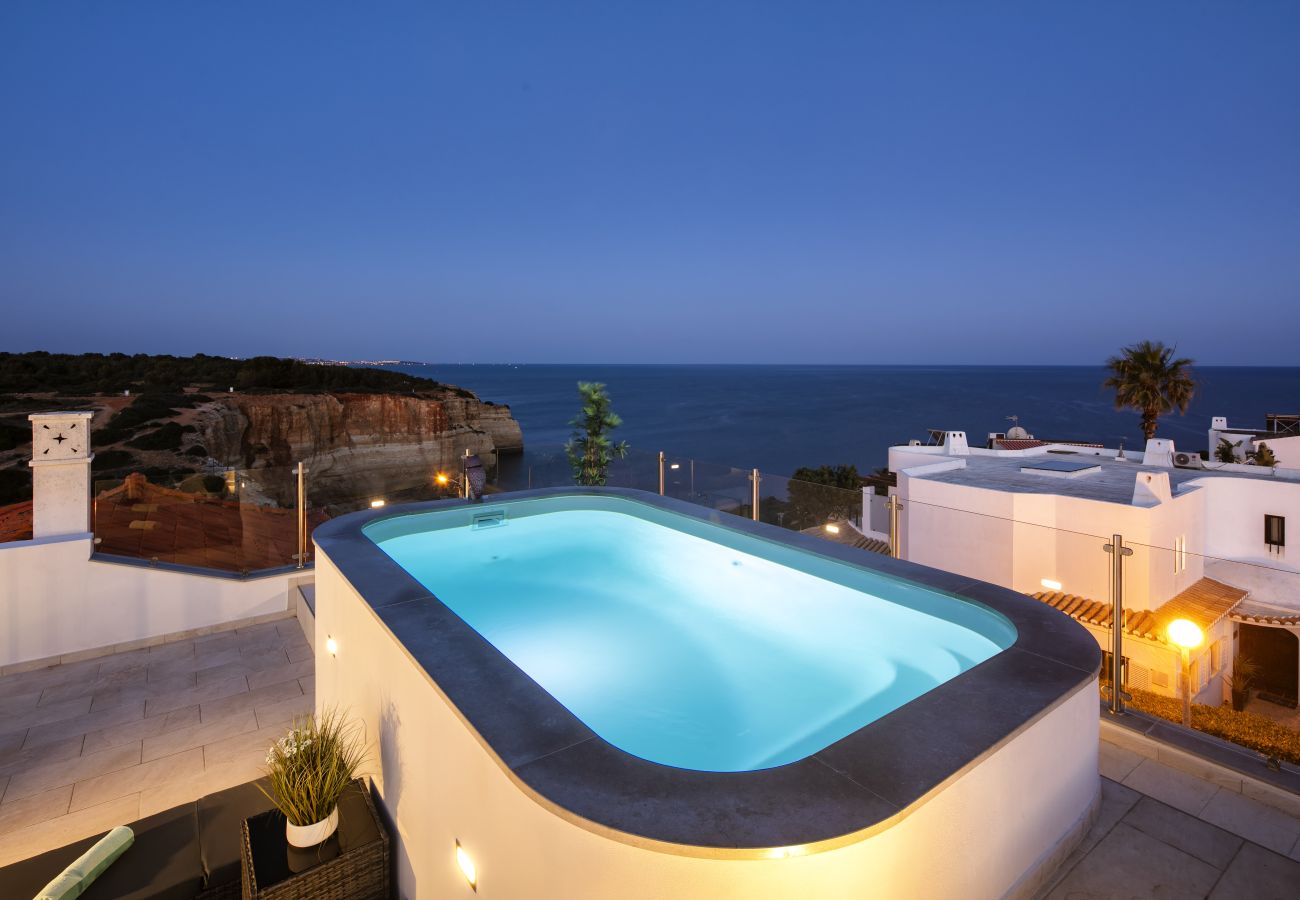 Roof terrace with private pool Casa Milhafre Benagil at night