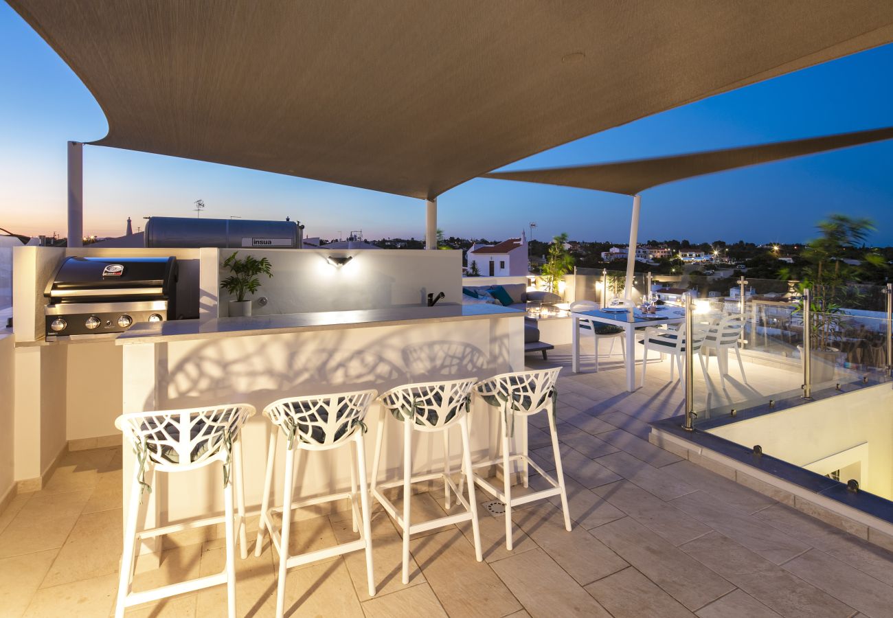 Bar area roof terrace Casa Milhafre Benagil at night